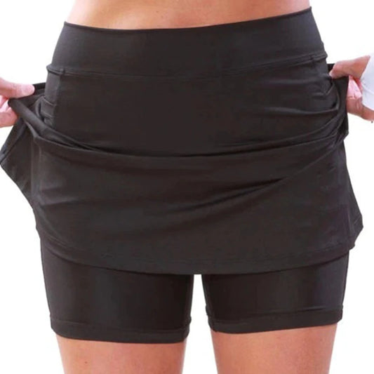 Gymshorts med täckande kjol och push-up – Komfort och stil för aktiva dagar.