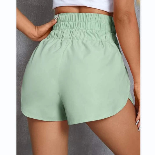 Gymvänliga högmidjade lössittande shorts